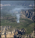 Smoke mostly overhead, with light impacts possible